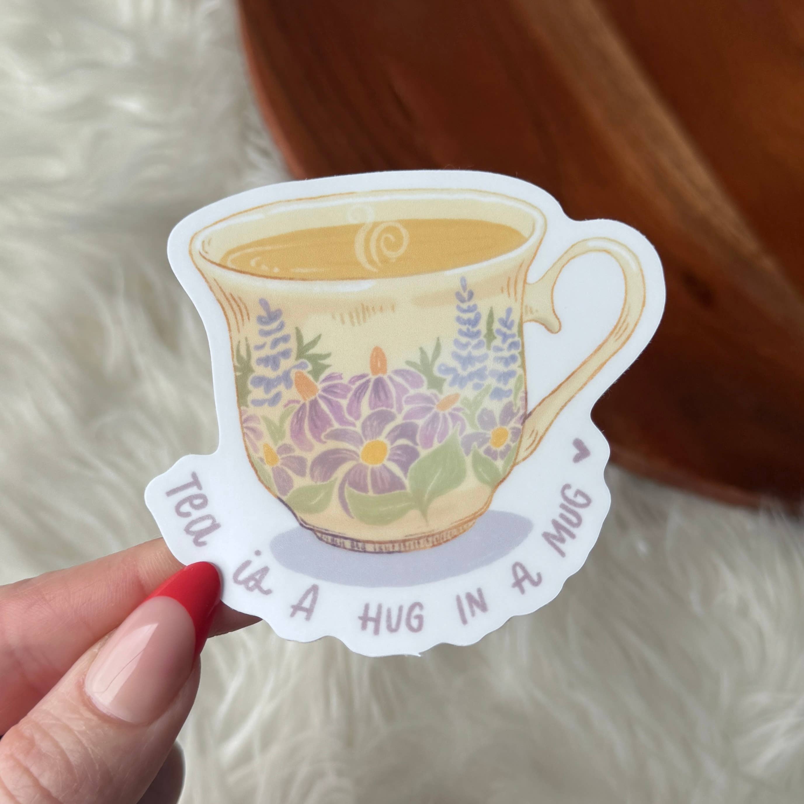 "Tea is a hug in a mug" Sticker by Big Moods